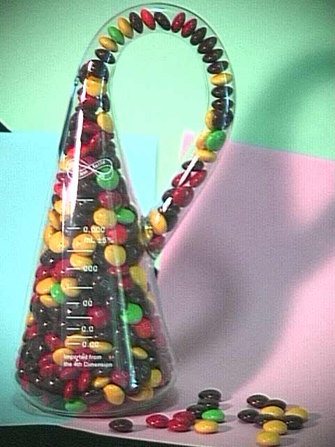 Klein Bottle filled with M&M's Candy, with calibration label