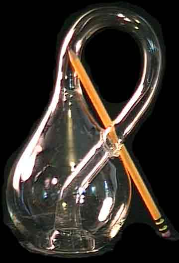 Big glass Klein Bottle and a pencil